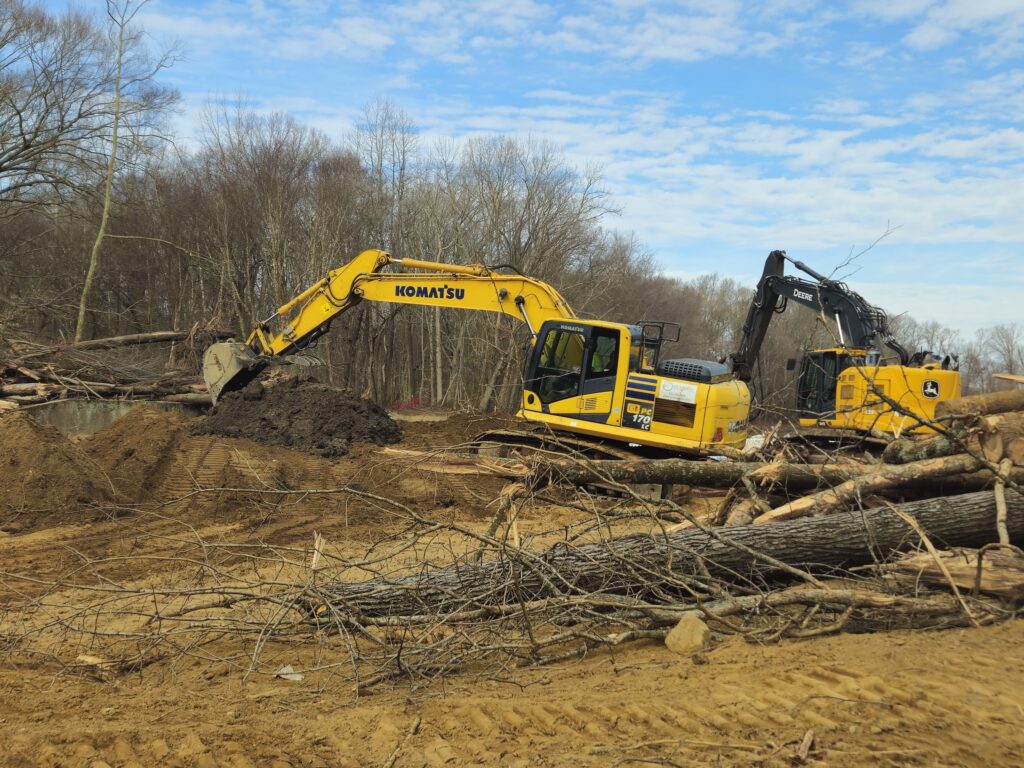 Moving the dirt during construction at Cypress Branch Dam | Jessie Thomas-Blate